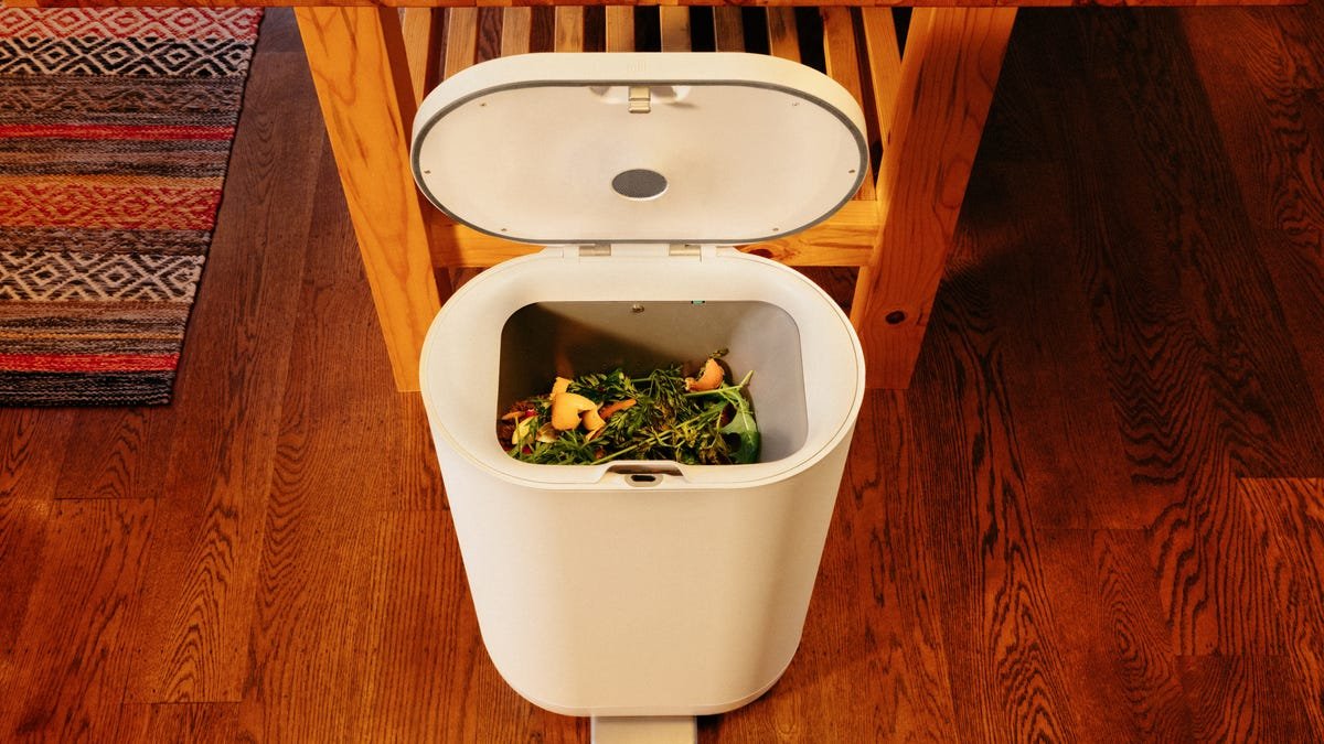 mill kitchen bin with food scraps inside