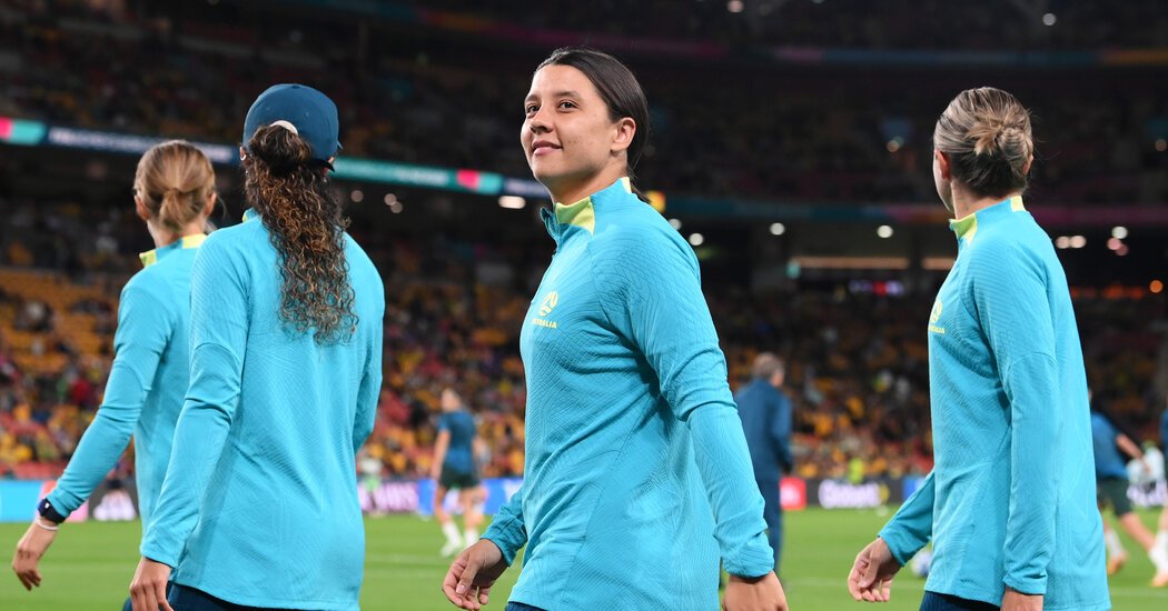 One co-host is out. Can Sam Kerr and Australia avoid the same fate?