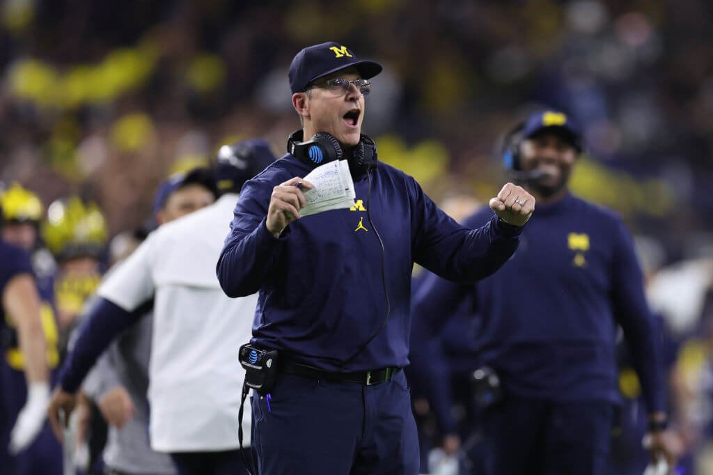 Chargers hire Michigan's Harbaugh as coach: Source