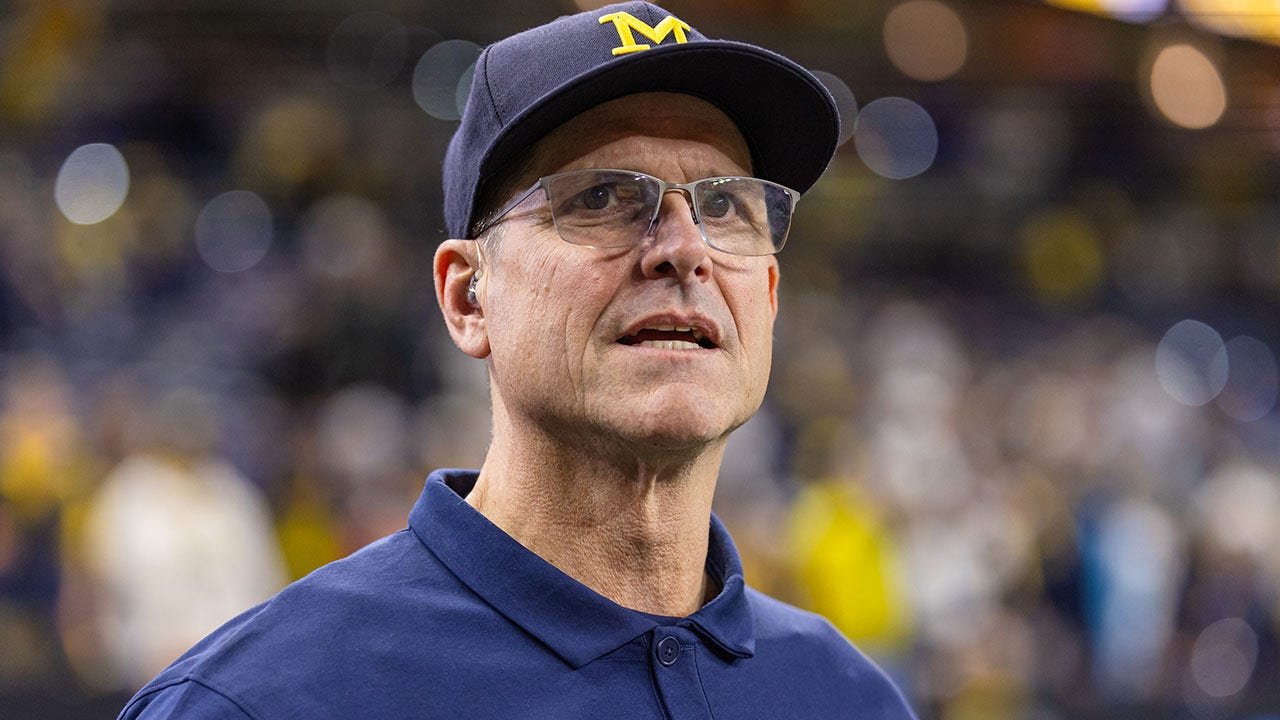 Michigan's Jim Harbaugh wants firing protection clause in contract amid NCAA probes, NFL flirtation: report